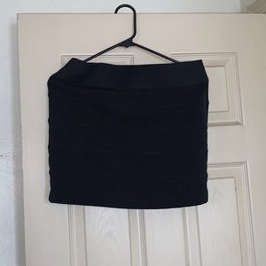 Large black mini skirt
